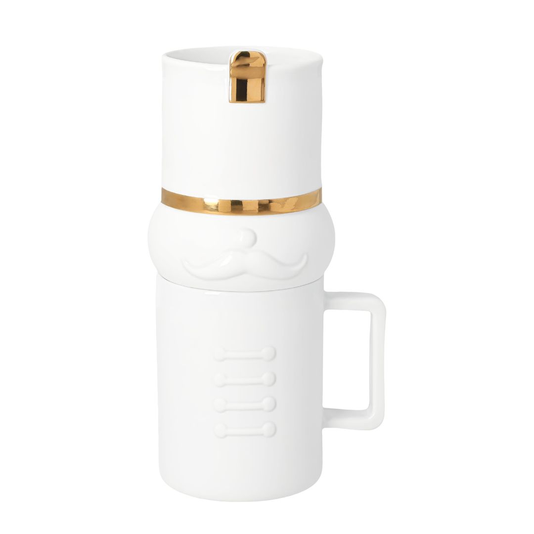 Zweiteiliges räder Becher Set Magnus aus weißem Porzellan mit Tasse, Keksaufsatz und Nussknacker Figur