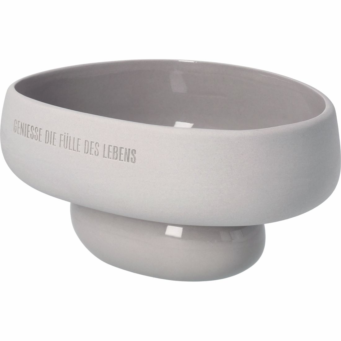 Nahaufnahme des eingeprägten Schriftzugs Genieße die Fülle des Lebens auf grauem Steinzeug