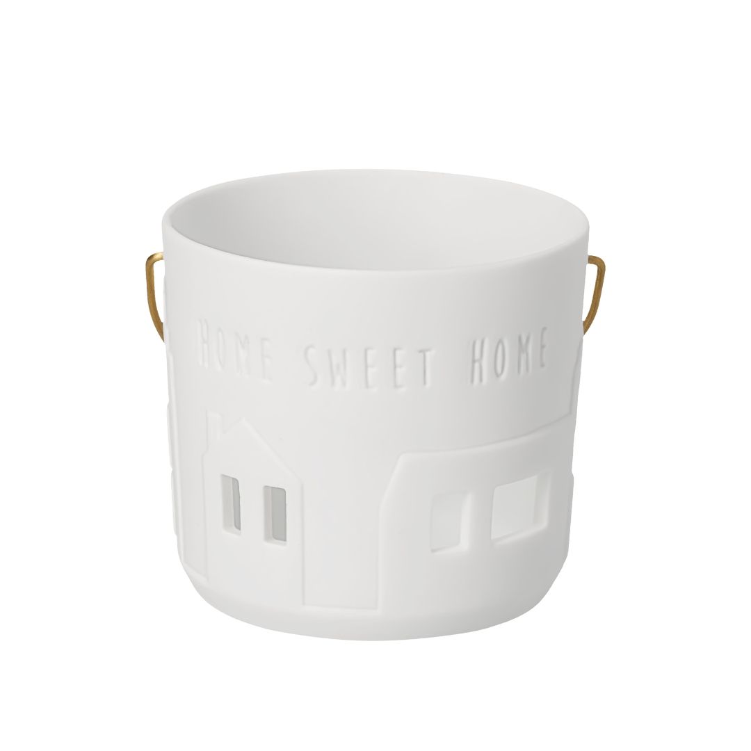 räder Geschenklaterne Home sweet home aus weißem Porzellan mit Häuser-Ausstanzungen und Messinghenkel