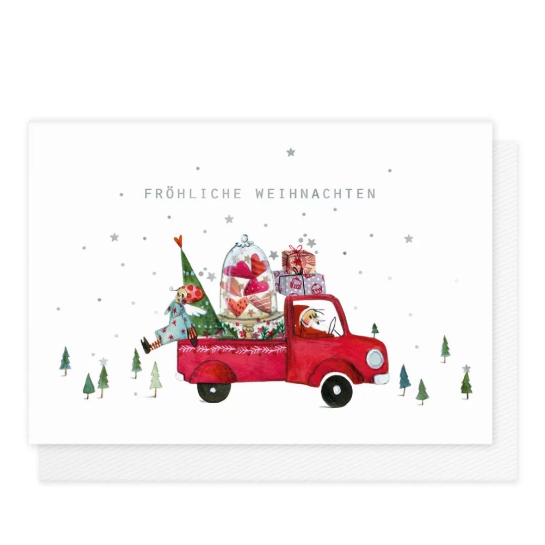Weihnachtskarte, Liebevoll illustrierte Klappkarte Fröhliche Weihnachten von Silke Leffler für den Grätz Verlag mit einem roten Pickup-Auto beladen mit Geschenken, Tannenbaum und einem kleinen Engel