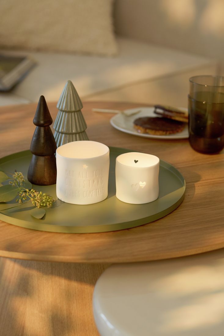 Stimmungsvoll leuchtendes räder Porzellan-Teelicht Lovely Christmas als gemütliche Adventsdeko