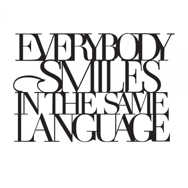 Wandpoesie "Everbody Smiles in the Same Language"